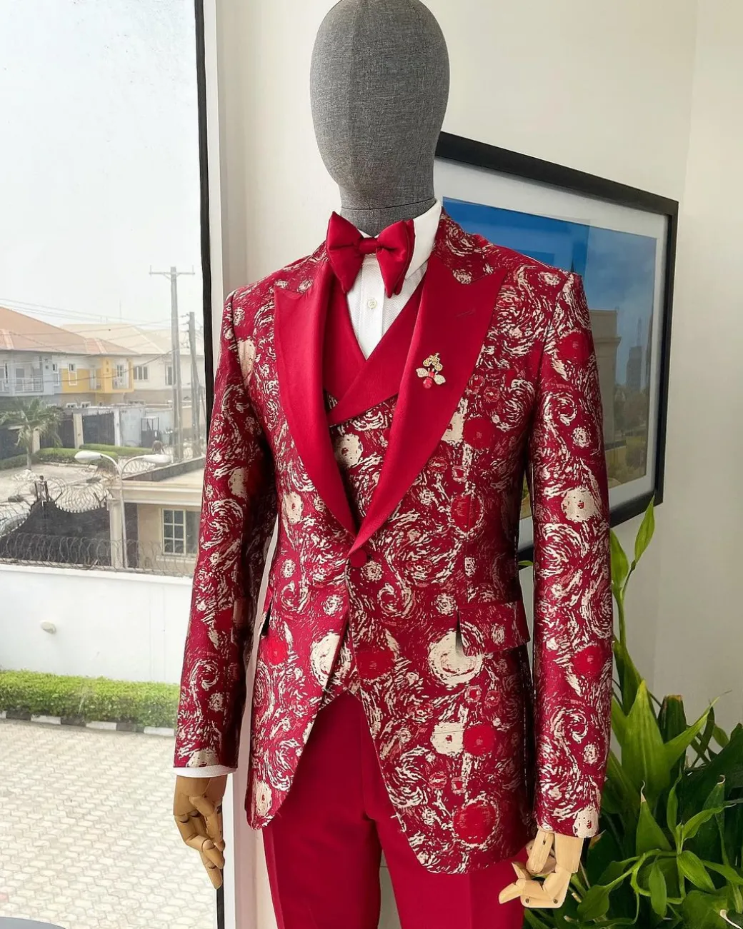 A Candy red & splash of silver, peak lapel stratocumulus patterned jacquard suit