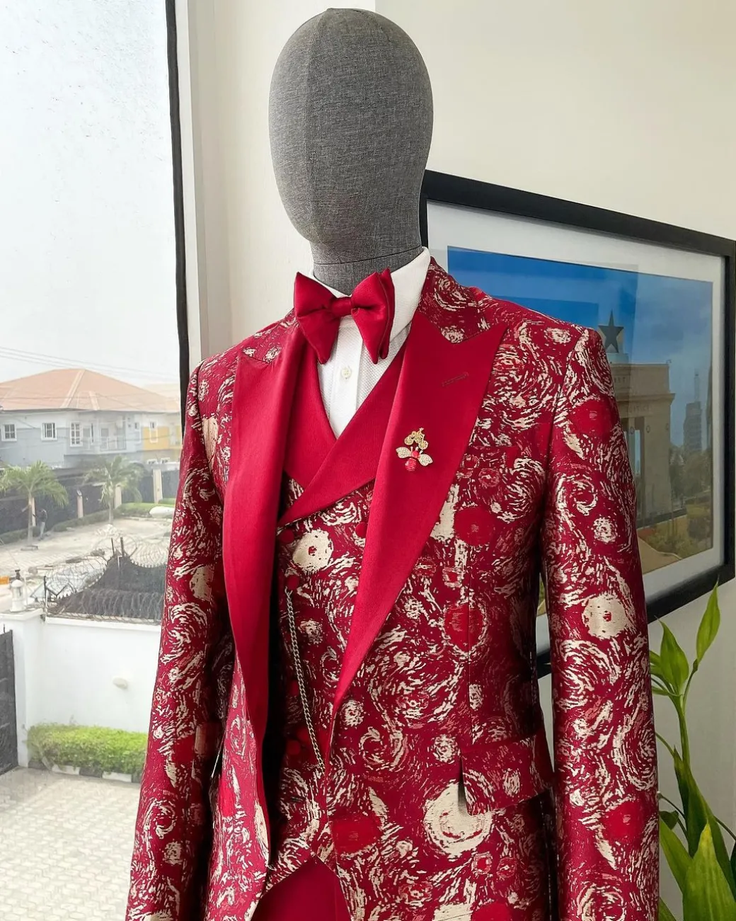 A Candy red & splash of silver, peak lapel stratocumulus patterned jacquard suit