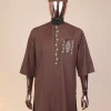 A caramel Brown, chinoiserie chic pagoda with layers metallic wire embroidery details, African kaftan native.