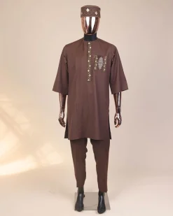 A caramel Brown, chinoiserie chic pagoda with layers metallic wire embroidery details, African kaftan native.