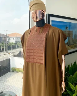 A Caramel brown, distributed square and dotted circle embroidery Agbada