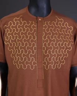A Caramel brown, front flap with gold Swarovski button, connected hexagon Embroidery detailing kaftan and Sokoto