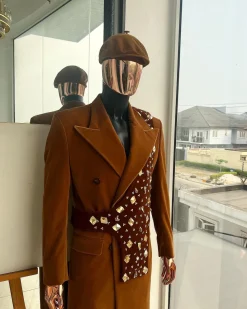 A Caramel brown, soaked velvet, peak lapel double breasted trench suit