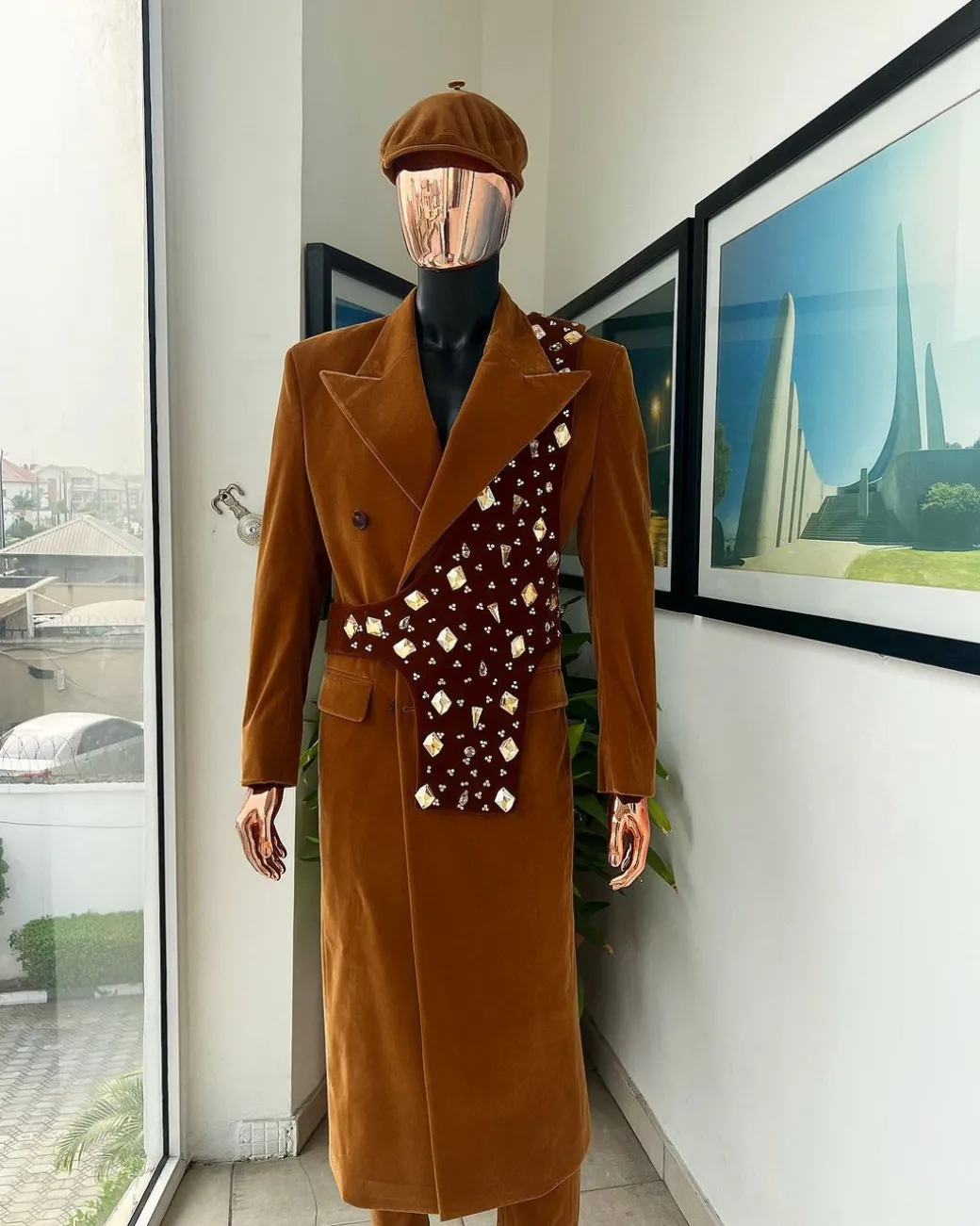 A Caramel brown, soaked velvet, peak lapel double breasted trench suit