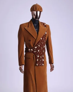 A Caramel brown, soaked velvet, peak lapel double breasted trench suit