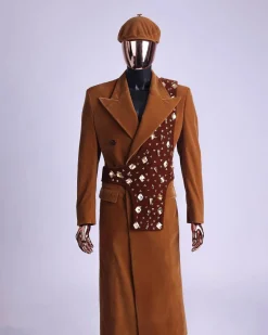 A Caramel brown, soaked velvet, peak lapel double breasted trench suit