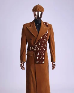 A Caramel brown, soaked velvet, peak lapel double breasted trench suit