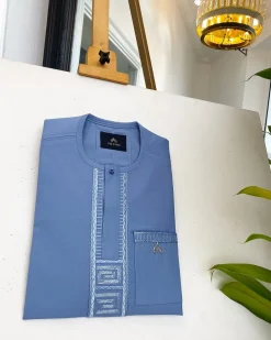 A Carolina blue, embroidery front flap, clear view Swarovski button, African traditional senator kaftan native.