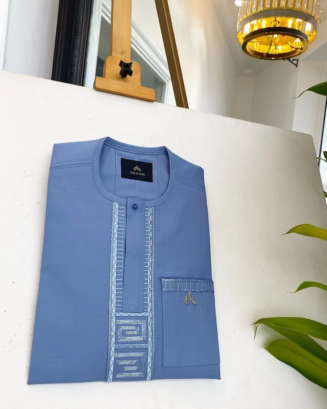 A Carolina blue, embroidery front flap, clear view Swarovski button, African traditional senator kaftan native.