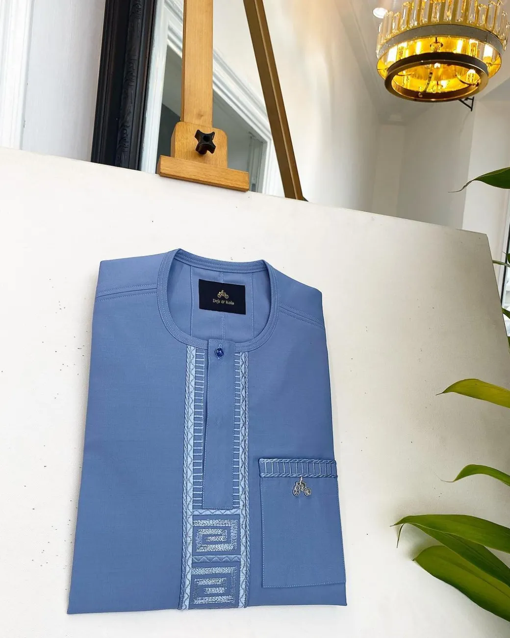 A Carolina blue, embroidery front flap, clear view Swarovski button, African traditional senator kaftan native.