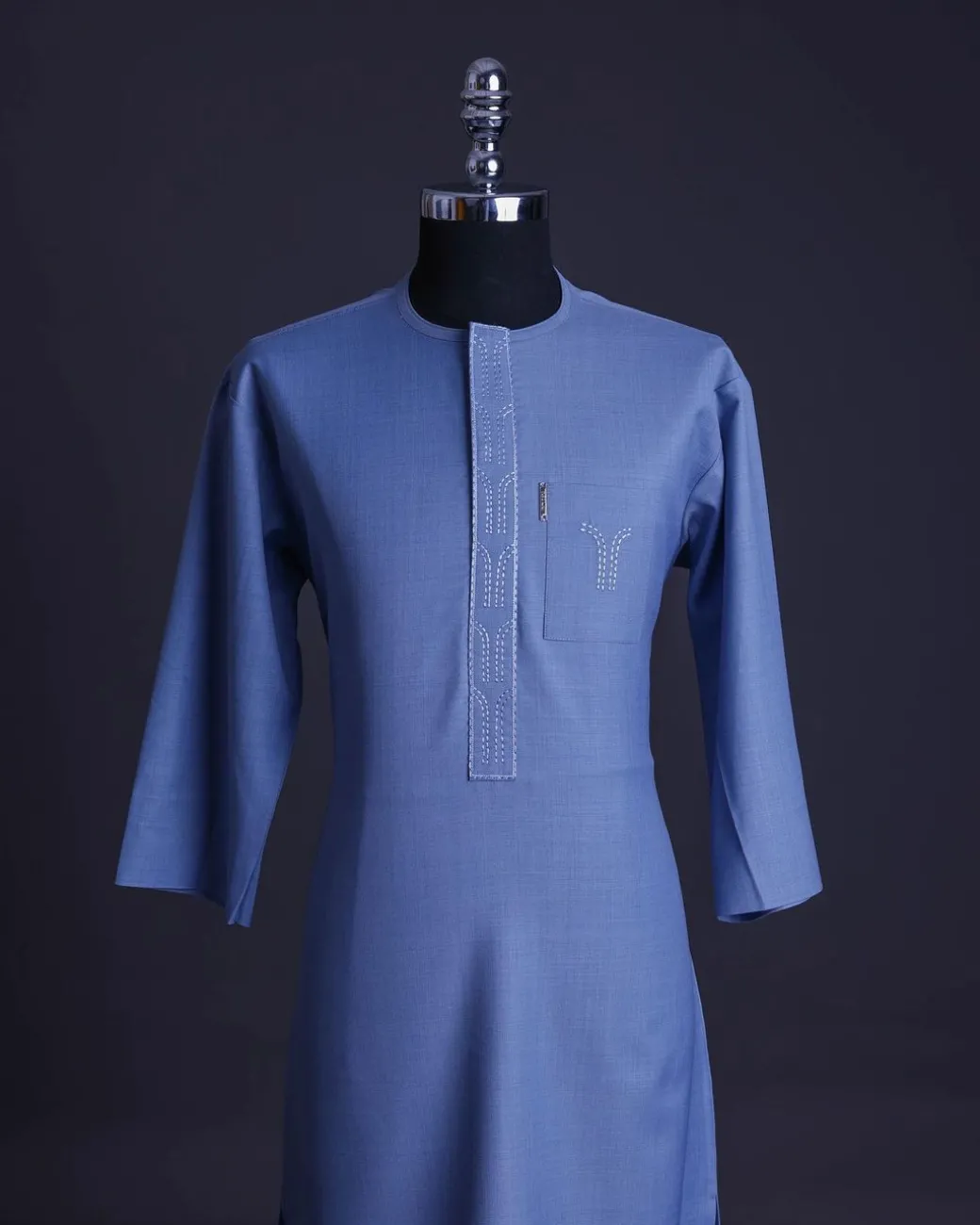 A Carolina blue, front flap with side drop embroidery detailing African senator kaftan native.