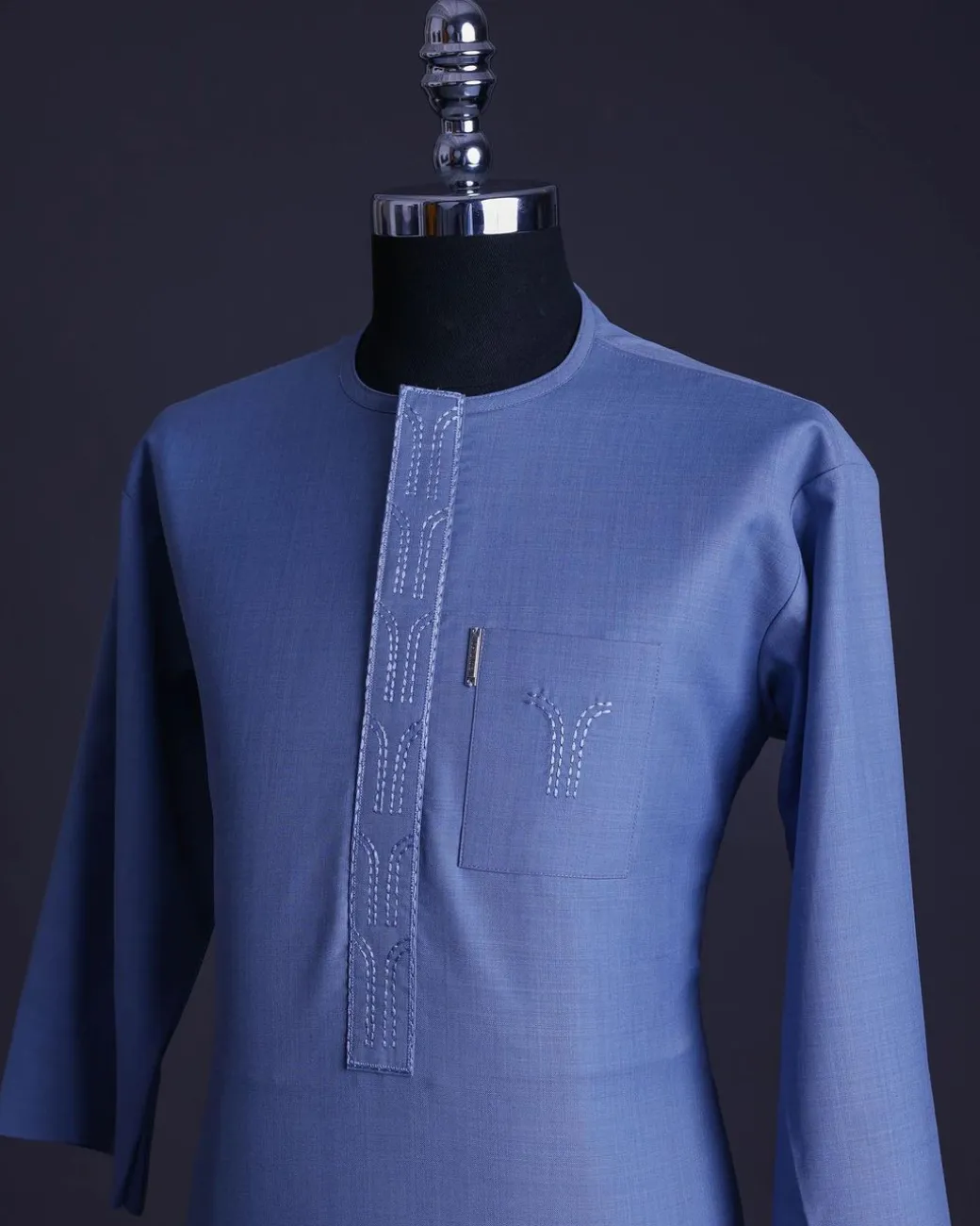 A Carolina blue, front flap with side drop embroidery detailing African senator kaftan native.