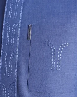 A Carolina blue, front flap with side drop embroidery detailing African senator kaftan native.