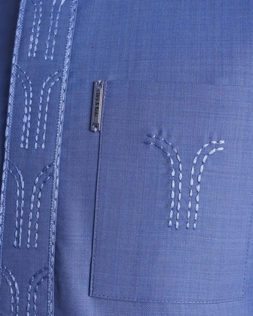 A Carolina blue, front flap with side drop embroidery detailing African senator kaftan native.