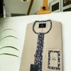 A Carton-coloured Swarovski stone detailing on the flap and pocket African Kaftan and Sokoto
