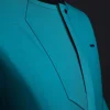 A Castleton green, front flap, patterned flap with black Swarovski button, short sleeve African senator kaftan native.