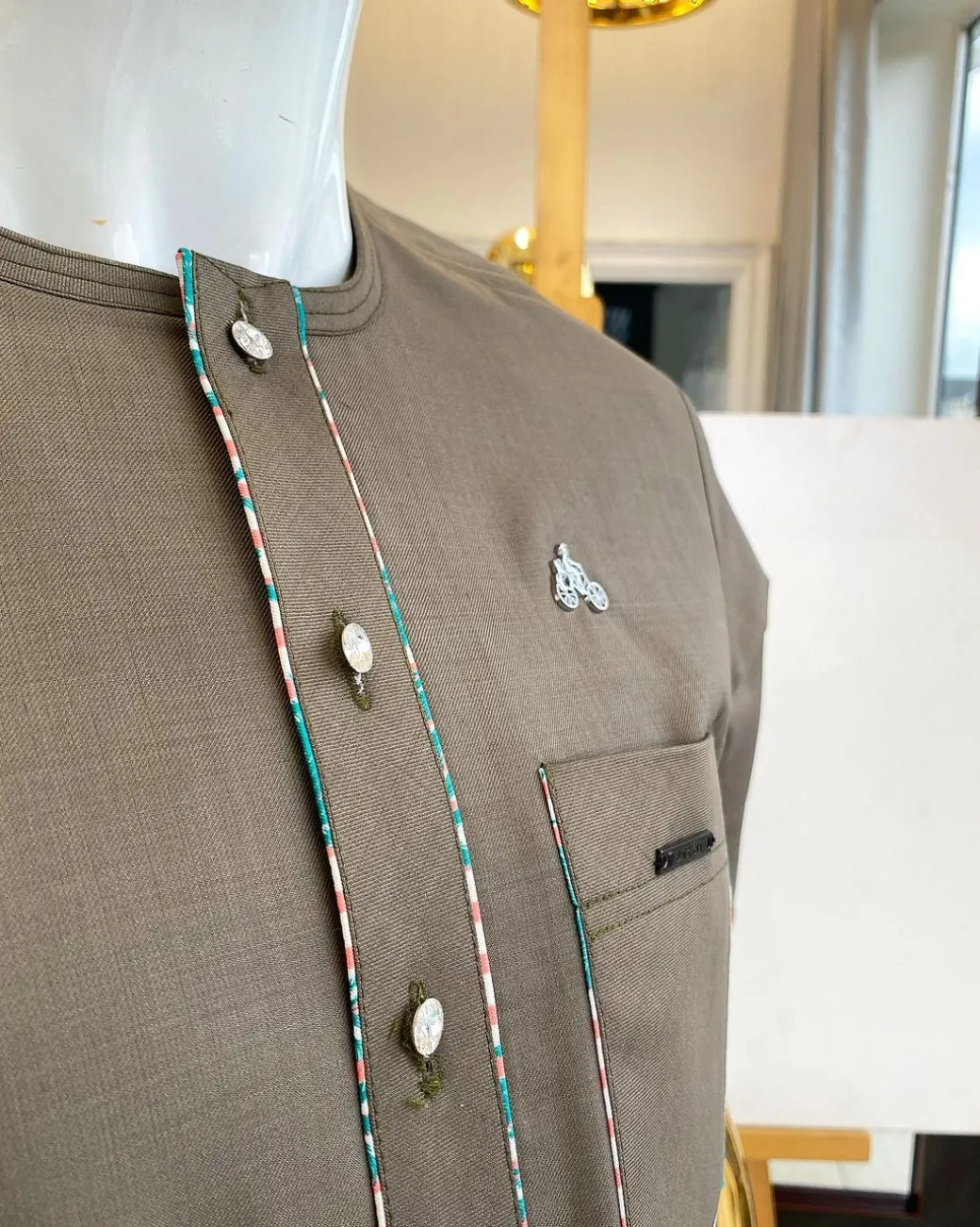 A cedar grey paisley mix, front flap with Swarovski buttons short-sleeved African traditional native senator kaftan