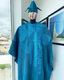 A Cerulean blue royal embroidery design agbada, dashiki, “abeti Aja” matching hat & sokoto