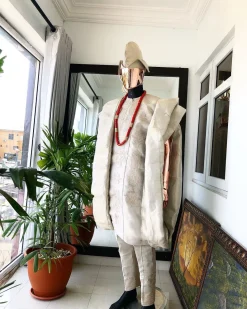 A Champagne Gold Interconnected Embroidery 3 Piece Traditional Agbada