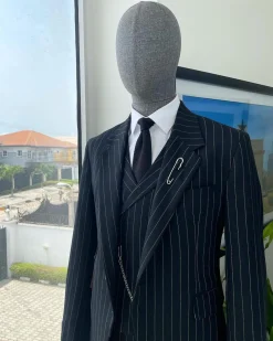 A charcoal black & white pencil stripe Jorgecarli ceremonial super 140’s “Board Room” notch lapel patch pocket suit