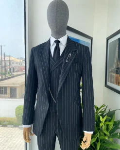 A charcoal black & white pencil stripe Jorgecarli ceremonial super 140’s “Board Room” notch lapel patch pocket suit