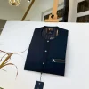 A charcoal black and green Kaftan with Swarovski detailing and sokoto