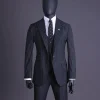 A charcoal black and ivory pencil stripe, notch lapel, knitted one button suit