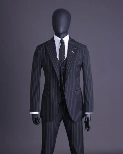 A charcoal black and ivory pencil stripe, notch lapel, knitted one button suit