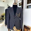 A Charcoal Black and ivory Check Peak Lapel Corporate Suit