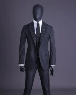 A charcoal black and ivory pencil stripe, notch lapel, knitted one button suit