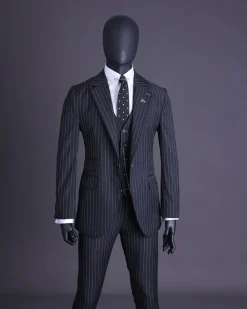 A charcoal black and ivory pencil stripe, notch lapel, knitted one button suit