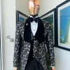A charcoal black and silver spiral jacquard, shawl lapel tuxedo suit