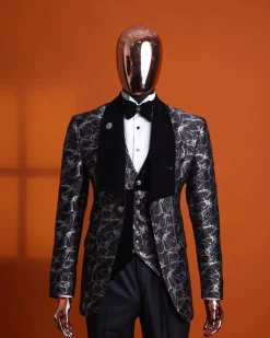 A charcoal black and silver spiral jacquard, shawl lapel tuxedo suit