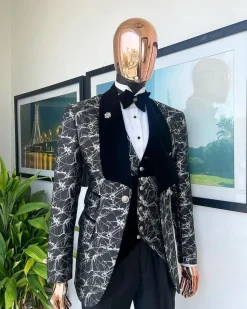 A charcoal black and silver spiral jacquard, shawl lapel tuxedo suit