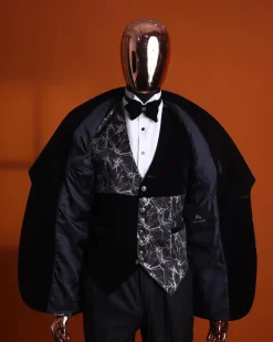 A charcoal black and silver spiral jacquard, shawl lapel tuxedo suit
