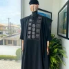 A Charcoal black, “Arewa” interwoven pattern embroidery details Agbada