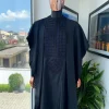 A Charcoal Black, Connected Square Embroidery Design with Blue Detailing Agbada