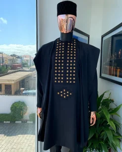A charcoal black, connected square embroidery design with matching gold and red Swarovski stone details agbada