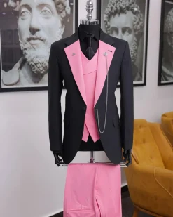 A charcoal black “contrast” pink notch lapel suit