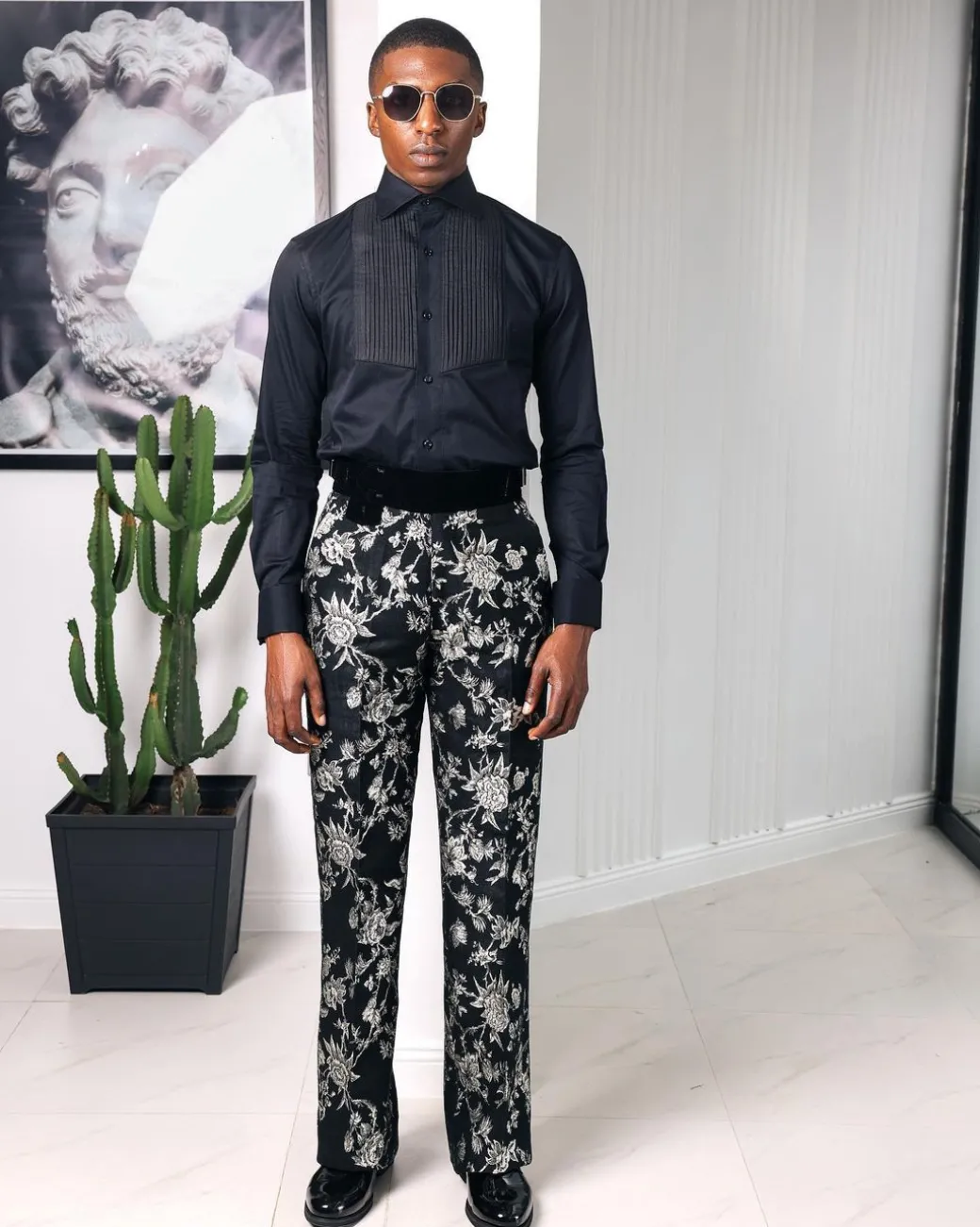 A Charcoal black, cut away collar, pleated evening tuxedo shirt.