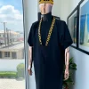 A charcoal black dagbtan, connected star gold embroidery detailing senator native.