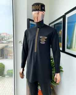 A charcoal black, dotted flap, kissing wave embroidery detailing hat and flap pocket traditional senator kaftan native