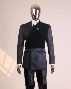 A charcoal black “equalizer” quadruple breasted, knitted, peak lapel with velvet tuxedo jacquard suit