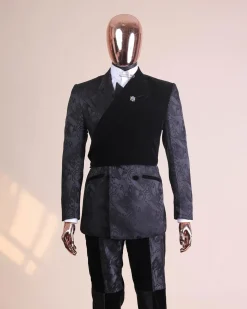 A charcoal black “equalizer” quadruple breasted, knitted, peak lapel with velvet tuxedo jacquard suit