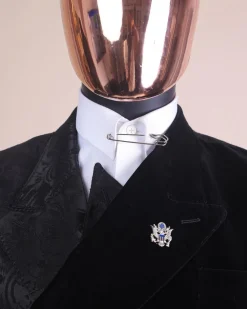 A charcoal black “equalizer” quadruple breasted, knitted, layered peak lapel with velvet overlay-ed tuxedo jacquard suit