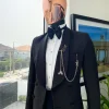 A Charcoal black, floral pattern, double-breasted shawl lapel jacquard tuxedo suit.