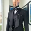 A Charcoal black, floral patterned jacquard tuxedo suit