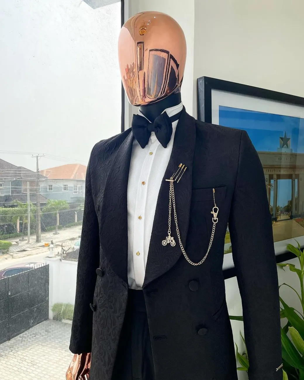 A Charcoal black, floral pattern, double-breasted shawl lapel jacquard tuxedo suit.