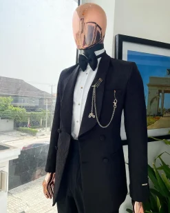 A Charcoal black, floral pattern, double-breasted shawl lapel jacquard tuxedo suit.