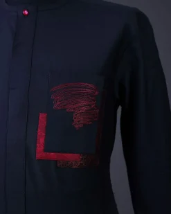 A charcoal black front flap with crystal Swarovski buttons, flame embroidery 3/4 sleeve details African senator kaftan native.